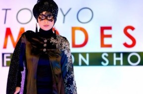 A model presents a creation by designer Lynn Siregar from her brand Weddingku Gallery during Tokyo Modest Fashion Show, Muslim fashion show, at Halal Expo Japan in Tokyo